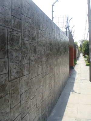 Muro perimetrico de edificio multifamiliar 